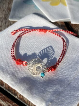 Μαρτάκι με ασημένιο ήλιο